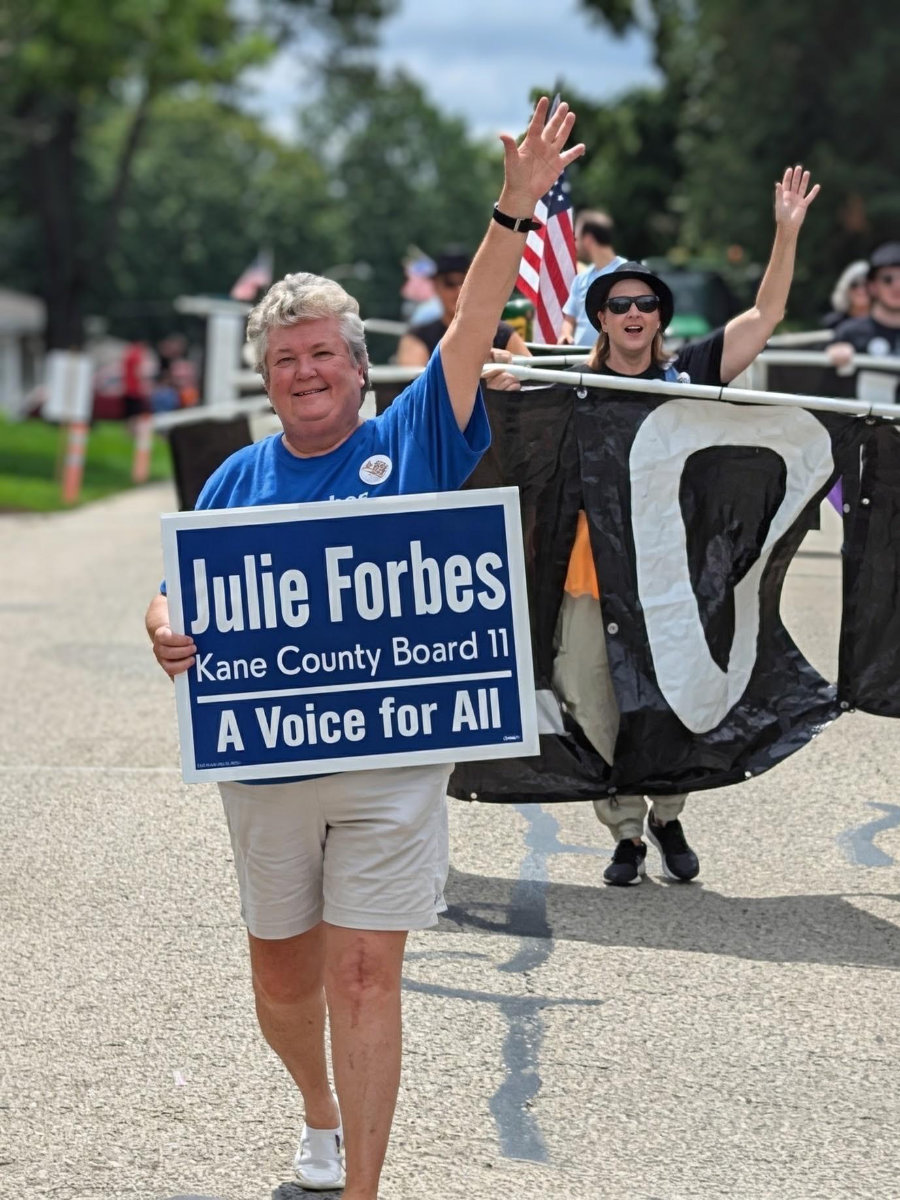julie forbes marching in a parade
